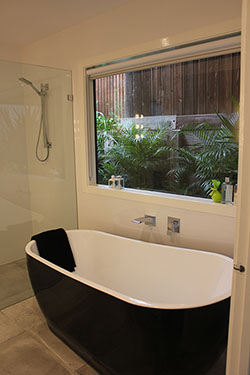 a free-standing bath in a modern bathroom